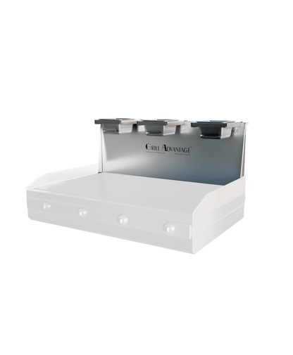 Grill Advantage 24-inch backsplash unit with four condiment pan holders along the top rail, shown mounted on a flat-top griddle, angled front view.