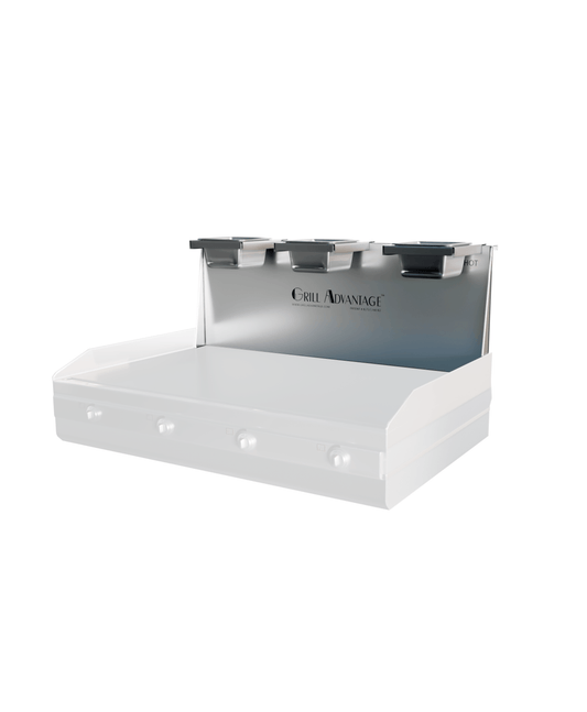 Grill Advantage 24-inch backsplash unit with four condiment pan holders along the top rail, shown mounted on a flat-top griddle, angled front view.
