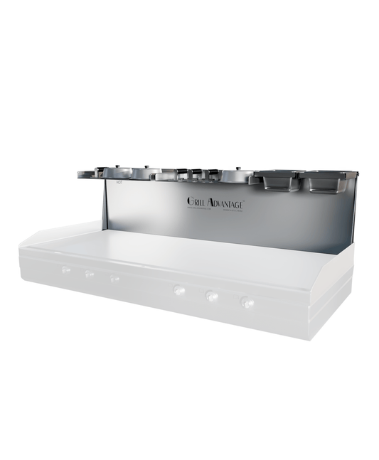 Grill Advantage 60-inch backsplash system viewed from the front-right, showing a row of pan holders along the top shelf with a HOT label on the left, mounted over a ghosted griddle.